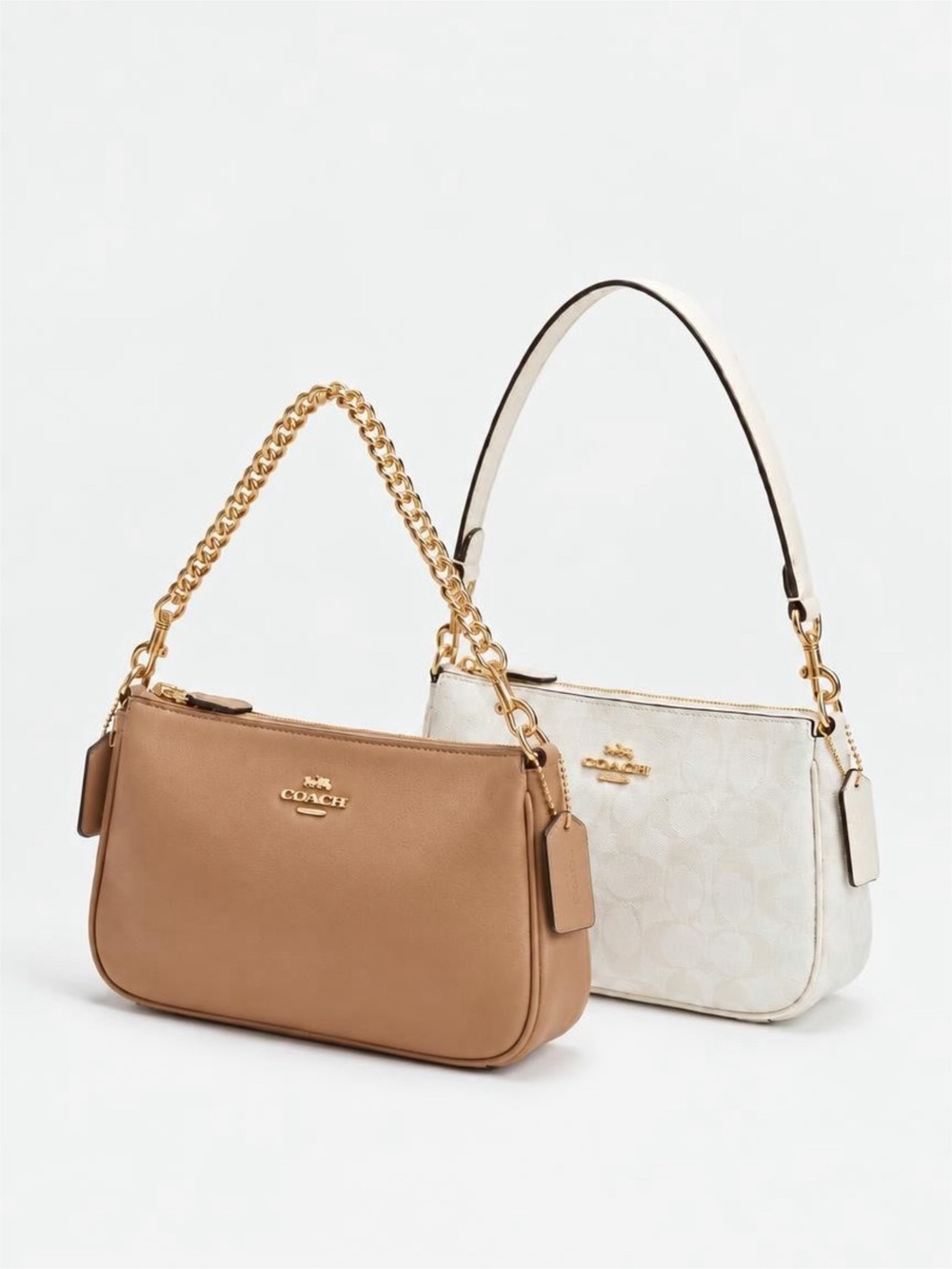 Pair of mini underarm Coach bags